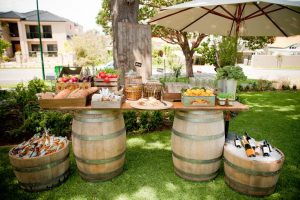 Outdoor corporate event wine barrel bar